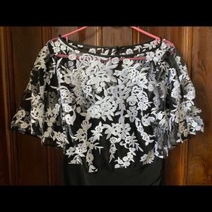 Black dress with white embroidery